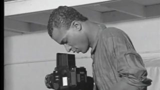 Black gay blowjob at photo shoot