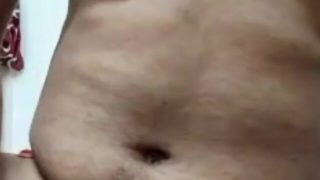 Indian man in hot red outfit